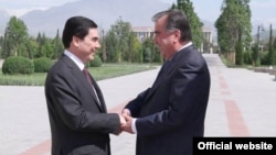 Turkmenistan's Gurbanguly Berdymukhammedov (left) and Tajikistan's Emomali Rahmon in Dushanbe on May 5 -- new best friends forever?