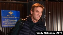 Russian opposition leader Aleksei Navalny leaves a detention center in Moscow early on October 14.