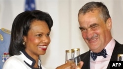 U.S. Secretary of State Condoleezza Rice and her Czech counterpart, Karel Schwarzenberg, toast after signing the missile-defense deal in Prague on July 8