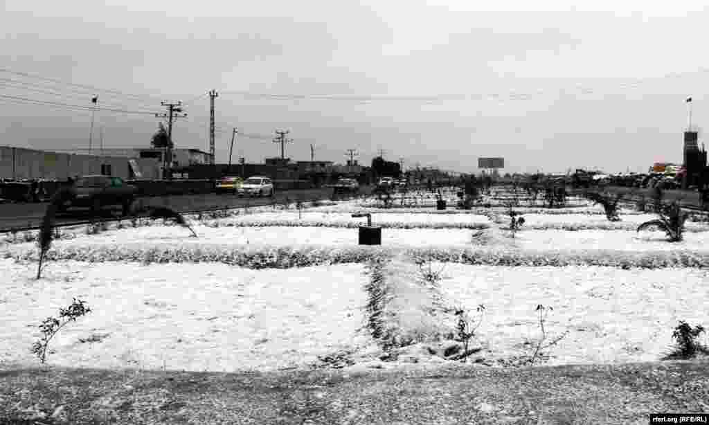 Snow covers a field in Kandahar, Afghanistan.