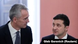 Ukrainian President Volodymyr Zelenskiy (right) and NATO Secretary-General Jens Stoltenberg in Kyiv on October 31. 