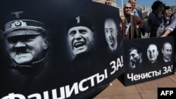 Opposition activists rallied in central Moscow on June 5 against the draft law to steeply increase fines for illegal protest activities, which was passed the same day by the lower house and a day later by Russia's upper house.