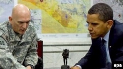 U.S. President Barack Obama is briefed by General Ray Odierno, commander of U.S. troops in Iraq, at Camp Victory in early April.