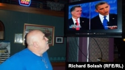 David Dials watches the Obama-Romney debate at Froehlich's.