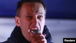 Political and social activist Aleksei Navalny speaks during an opposition protest in central Moscow on December 5.