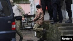 A Ukrainian sailor captured by the Russian FSB leaves a court in Simferopol, Crimea, on November 27.