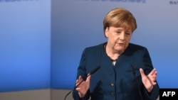 German Chancellor Angela Merkel delivers a speech on the second day of the 53rd Munich Security Conference in Munich on February 18.