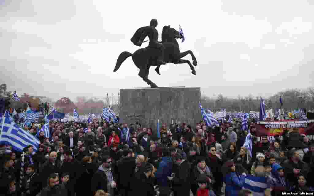 The crowd surrounds a statue of Alexander The Great during the Thessaloniki protest. Participants sang Greece&#39;s national anthem and held banners reading, &quot;There is only one Macedonia and it is Greek!&quot;