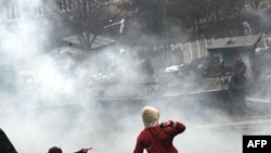 Kosovar Serbs throw stones at KFOR soldiers in Mitrovica on March 17.