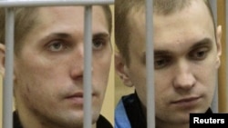 A combo photo of Uladzislau Kavalyou (left) and Dzmitry Kanavalau during a court hearing in Minsk in September 2011.