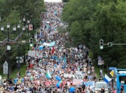 Protesters march in Khabarovsk on July 25.