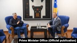 Kosovar President Hashim Thaci (left) meets with the country's prime minister, Ramush Haradinaj (file photo)