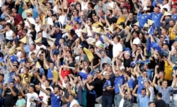 Kosovo fans celebrate a win against the Czech Republic on September 7 in Pristina at a Euro 2020 qualifier match.