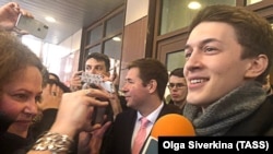 Yegor Zhukov speaks to journalists outside a court in Moscow on December 6.