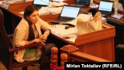 "I think most of my colleagues would not see the need to impose a dress code on journalists or other visitors to our building," says Shirin Aitmatova, who represents the ruling Ata Meken party.