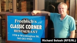 Greg Froehlich in front of his restaurant, one of a few left in downtown Steubenville