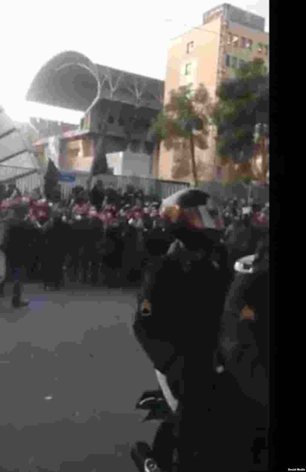 Riot police gather at Amir Kabir University in Tehran on January 11.