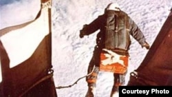 Kittinger steps off the gondola to begin his record-setting free-fall to Earth.