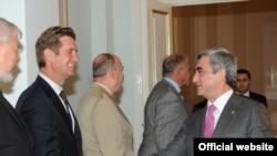 Armenian President Serzh Sarkisian (right) meets with members of the Minsk Group on July 8