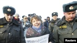 Interior Ministry officers detained Yevgenia Chirikova during a rally in Moscow last December. Now, she says, they are targeting her children.