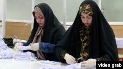 Volunteers sew face masks against the coronavirus in Iran.