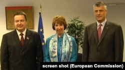 Serbian Prime Minister Ivica Dacic (left), EU foreign-policy chief Catherine Ashton (center), and Kosovo Prime Minister Hashim Thaci pose for a photo after a meeting in June.