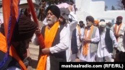 Sikh Afghans perform a religious celebration in the eastern province of Nangarhar. 