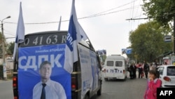 A campaign van makes its way through Osh, in southern Kyrgyzstan, on October 7.