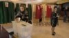 Candid Camera: Azerbaijani Election Workers Appear To Switch Ballot Box