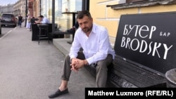 Aleksandr Zatulivetrov outside his restaurant Buterbrodsky in St. Petersburg. He estimates his losses at 5 million rubles ($68,000) and puts the blame squarely on government mismanagement of the crisis.