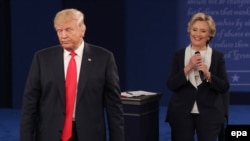 Hillary Clinton (right) and Donald Trump debate on October 9, 2016, before the U.S. election.