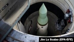 An unarmed Minutemen intercontinental ballistic missile is seen in its launch tube at a launch facility just outside Wall, South Dakota.