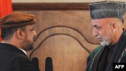 Afghan President Hamid Karzai (right) with Vice President Mohammad Qasim Fahim following the swearing-in ceremony in Kabul