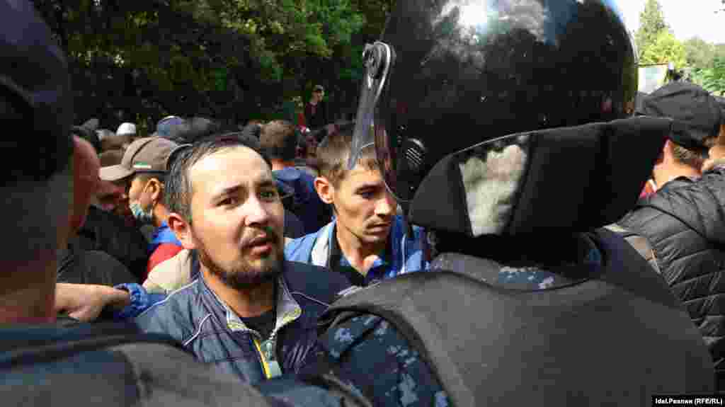 Protesters confront the police on August 15.