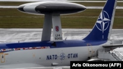 A NATO Airborne Warning And Control System (AWACS) aircraft stands on the tarmac at an airport close to Brussels on November 27, 2019.