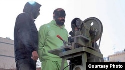 A convicted thief is shown having some of his fingers amputated. The regime's message seems clear: Punishment will be severe.