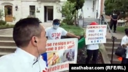 Protesters rally outside the Turkmen Embassy in Washington against the regime of Gurbanguly Berdymukhamedov on September 1.