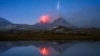 A lava flow from Kamchatka's Tobalchik Volcano, which last erupted in 1975, with the newly active Bolshaya Udina Volcano (right).