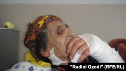 Eighty-nine-year-old Ozodamoh Saidnurulloeva was being attacked by a wolf in her yard before a neighbor scared it away.