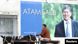 A campaign poster for Almazbek Atambaev, the current Kyrgyz prime minister and the front-runner in the October 30 presidential vote, in the village of Arashan, outside the capital, Bishkek