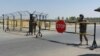 Uzbek soldiers guard a checkpoint over the Amu Darya River, which separates Uzbekistan and Afghanistan, near Termez. (file photo)