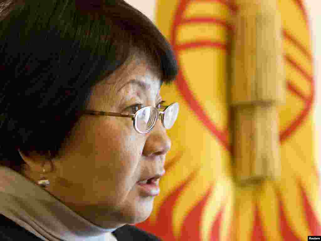 An interim government headed by opposition leader Roza Otunbaeva installed itself in Bishkek.