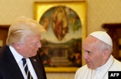 Pope Francis (right) meets with U.S. President Donald Trump at the Vatican on May 24.