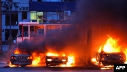 Vehicles blaze following a Russian strike on an industrial district of Zaporizhzhya, Ukraine, on January 8.