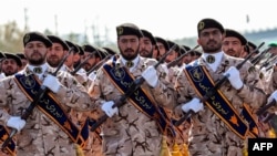 IRGC troops march during the annual military parade marking the anniversary of the outbreak of the devastating 1980-88 war with Saddam Hussein's Iraq, in Tehran in September 2018.