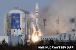 A Soyuz rocket carrying a Russian meteorological satellite lifts off at the Vostochny Cosmodrome outside the city of Uglegorsk in Russia's Far East.