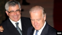 U.S. Vice President Joe Biden (right) with Bosnian Foreign Minister Sven Alkalaj at Sarajevo's international airport on May 19