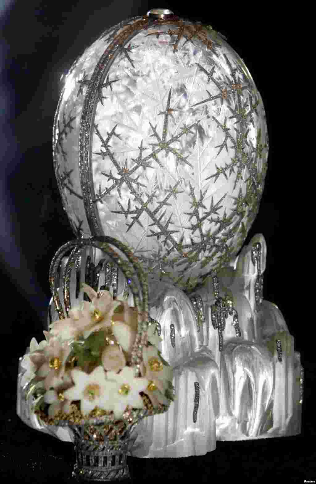 Over the next three decades, Carl Faberge would create another 49 eggs for Russia&#39;s last two tsars. Pictured is the Winter Egg, one of his most famous, crafted from rock crystal and etched with platinum and diamonds to resemble frost. The 14-centimeter egg opens to reveal a bejeweled basket of spring flowers.