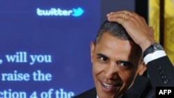 U.S. President Barack Obama speaks during his Twitter-based town hall meeting at the White House.