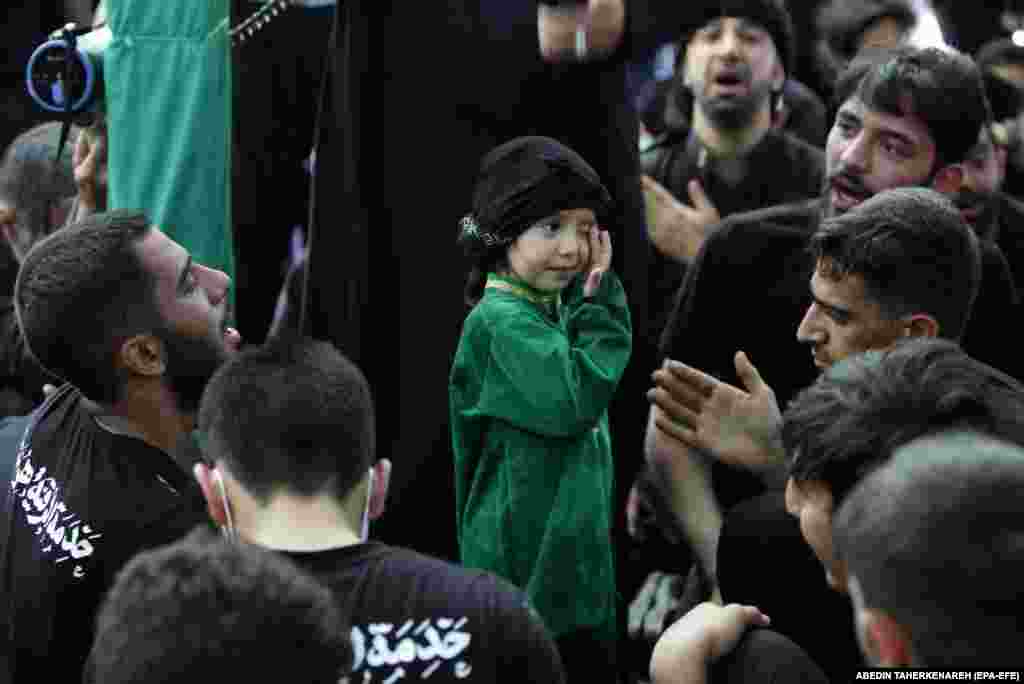 People are encouraged to cry or weep during the ceremonies to show their sadness. Children were among the mourners in Tehran on August 30.